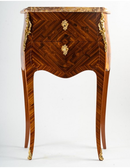 A Pair of bedside tables in Louis XV style.