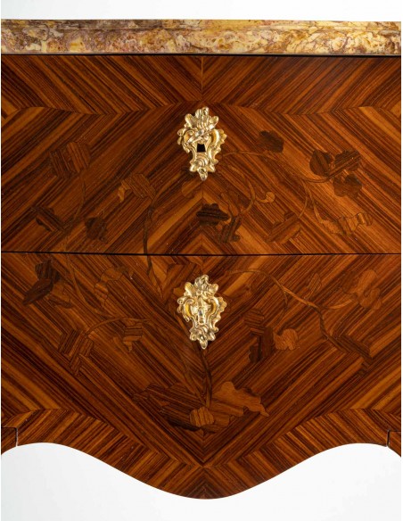 A Pair of bedside tables in Louis XV style.