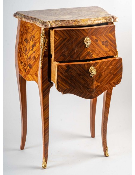 A Pair of bedside tables in Louis XV style.