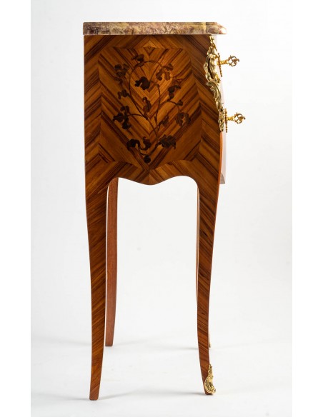A Pair of bedside tables in Louis XV style.