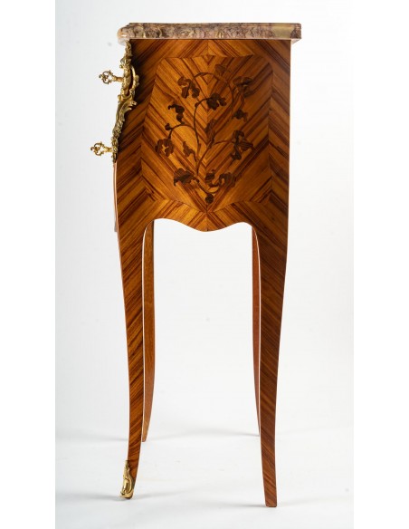 A Pair of bedside tables in Louis XV style.