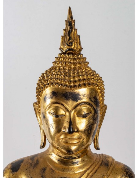 A gilt lacquered bronze Buddha.  19th century.