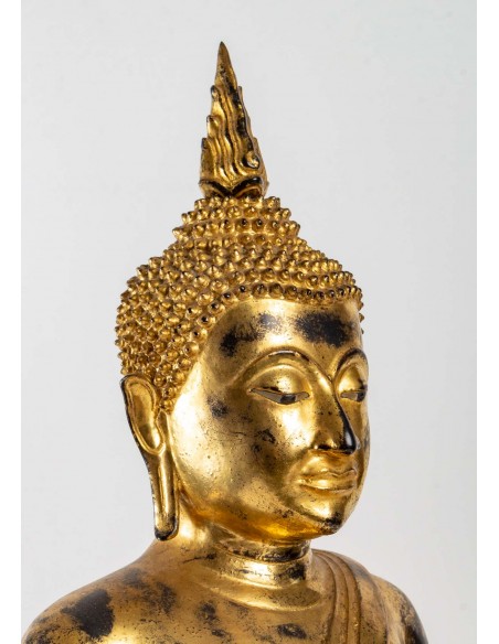 A gilt lacquered bronze Buddha.  19th century.