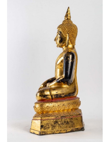 A gilt lacquered bronze Buddha.  19th century.