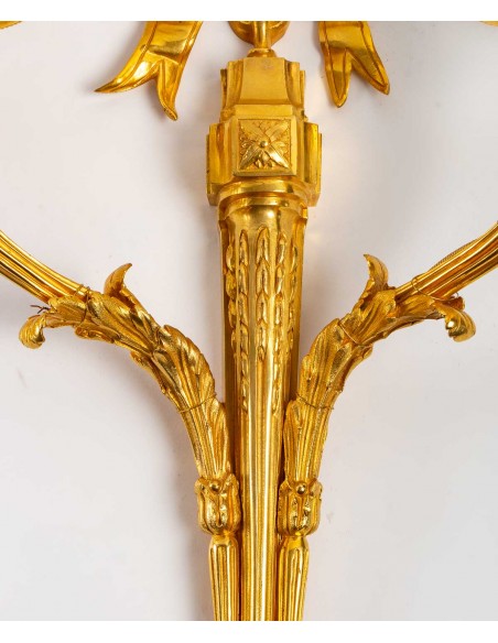 A pair of wall lights in the Louis XVI style. 19th century.
