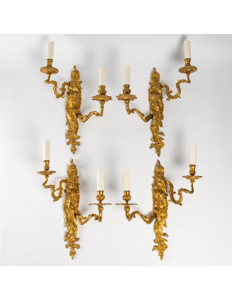 A Suite of Four Wall - Lights in Régence Style.  19th century.