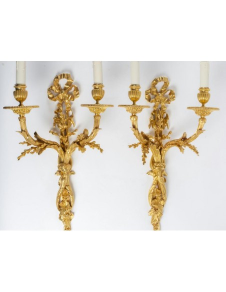 Paire d'appliques de style Louis XVI.  XIXème siècle.