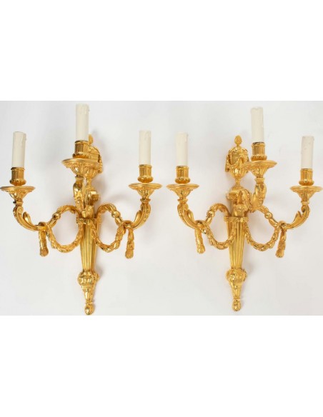 A Pair of Louis XVI style wall-lights. 19th century.