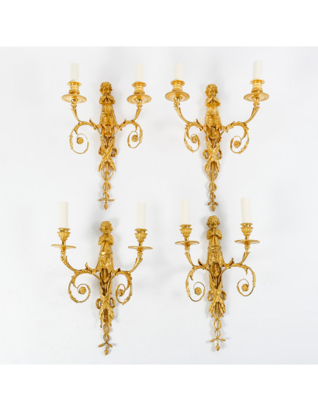 Suite of four Louis XVI style wall-lights.  19th century.