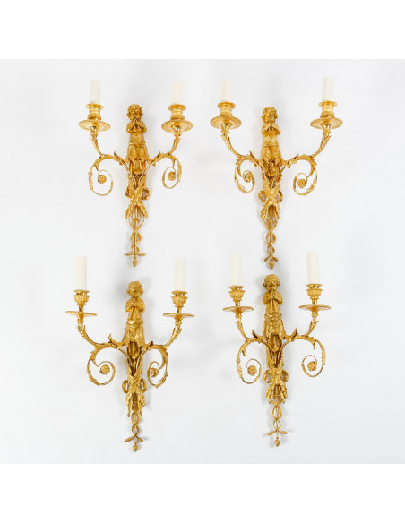 Suite de quatre appliques de style Louis XVI.  XIXème siècle.