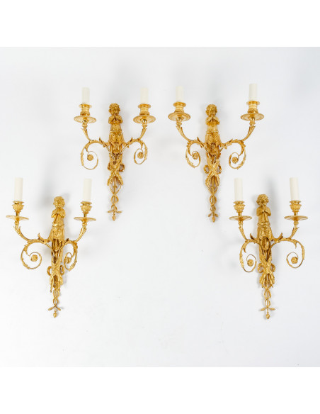 Suite of four Louis XVI style wall-lights.  19th century.