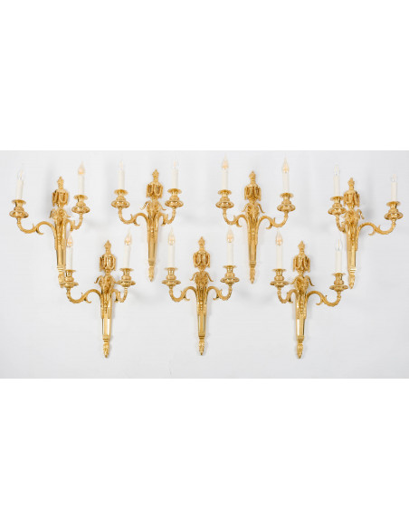 Suite de sept appliques de style Louis XVI.  XIXe siècle.