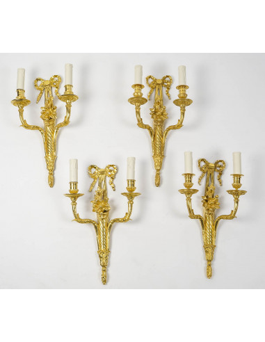 A Set of Four light walls in Louis...