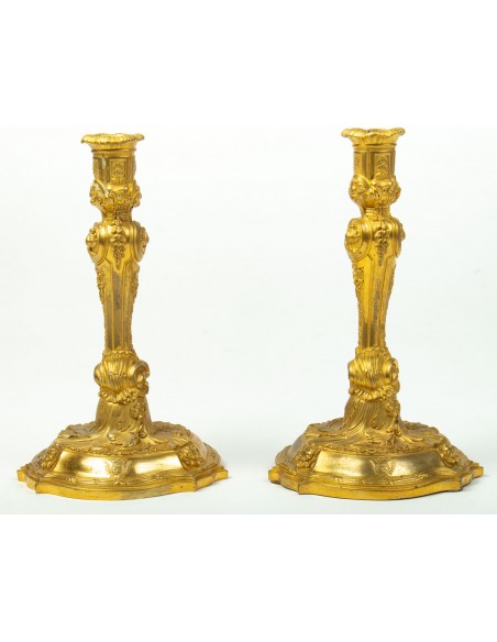 A pair of candlesticks in Louis XV style. 19th century.