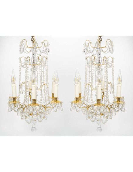 Paire de lustres en bronze doré et cristal de style Louis XVI, d'époque XIXème.