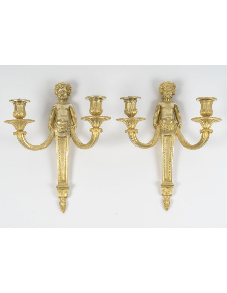 Paire d'appliques en bronze doré de style Louis XVI, d'époque Napoléon III. XIXème siècle.