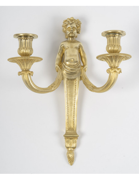 Paire d'appliques en bronze doré de style Louis XVI, d'époque Napoléon III. XIXème siècle.