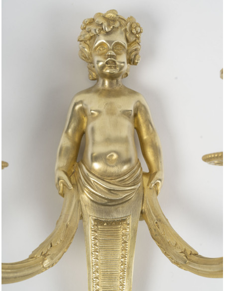 Paire d'appliques en bronze doré de style Louis XVI, d'époque Napoléon III. XIXème siècle.