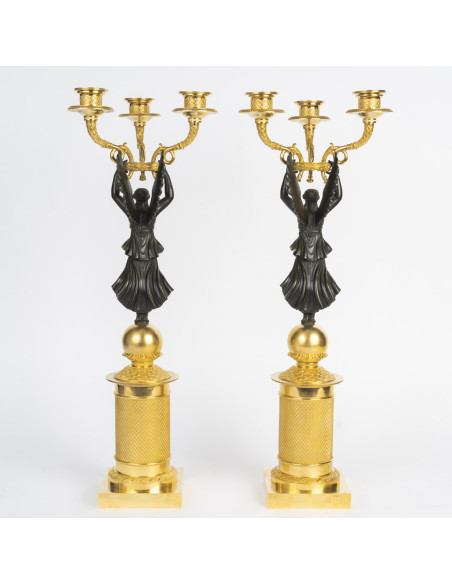 Paire de candélabre en bronze doré et patiné, d'époque Empire (1804-1815), XIXème siècle.