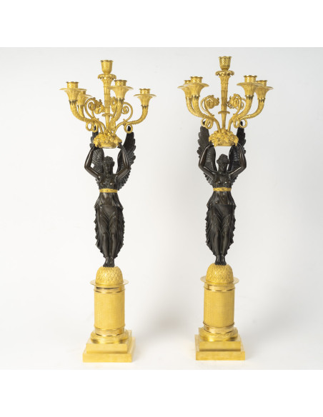 Large pair of gilded and patinated bronze candelabra, from the Empire period (1804–1815), 19th century