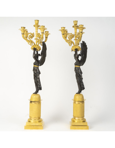 Large pair of gilded and patinated bronze candelabra, from the Empire period (1804–1815), 19th century