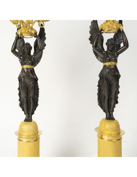 Large pair of gilded and patinated bronze candelabra, from the Empire period (1804–1815), 19th century