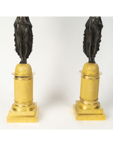Large pair of gilded and patinated bronze candelabra, from the Empire period (1804–1815), 19th century