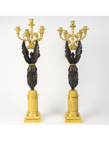 Large pair of gilded and patinated bronze candelabra, from the Empire period (1804–1815), 19th century