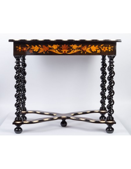 A Napoleon III period (1848 - 1870) marquetry table in Louis XIV style. 19th century.