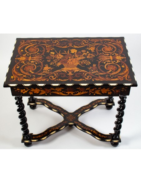 A Napoleon III period (1848 - 1870) marquetry table in Louis XIV style. 19th century.