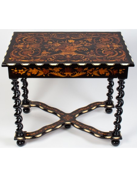 A Napoleon III period (1848 - 1870) marquetry table in Louis XIV style. 19th century.