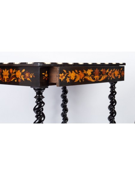 A Napoleon III period (1848 - 1870) marquetry table in Louis XIV style. 19th century.