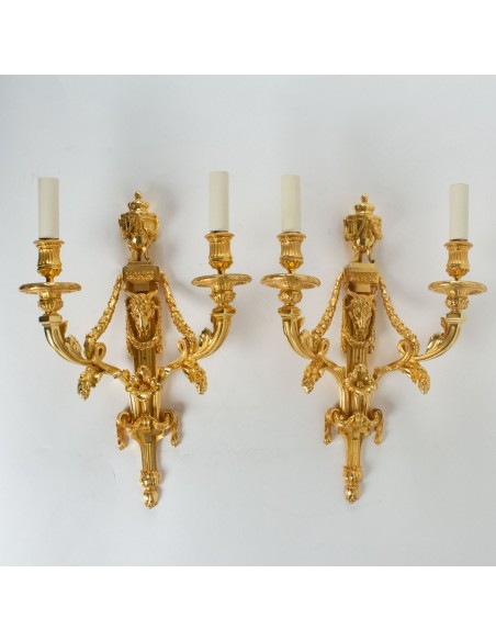 Paire d'appliques de style Louis XVI.  XIXème siècle.